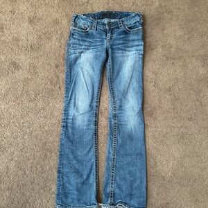 1921 bootcut jeans by Western Glove Works in size 27/34.